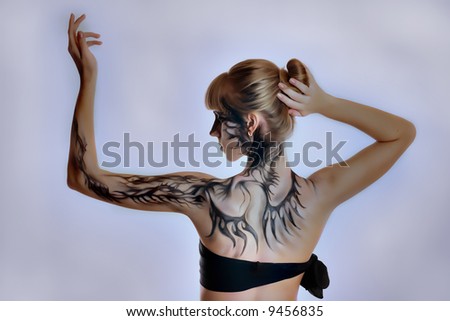 Beautiful girl with a paint on her skin