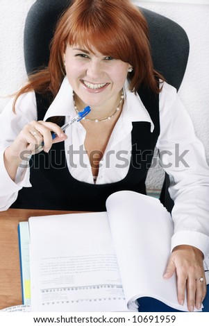 Woman smiling At work in the office