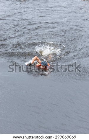 LAMPHUN, THAILAND - JULY 18 : Athletes are swimming in river at Lanna adventure tournament on July 18, 2015 in lamphun, Thailand