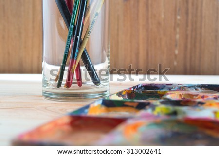 Paint brushes and paint box, artist tools