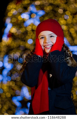 Christmas night, lovely girl is celebrating Christmas