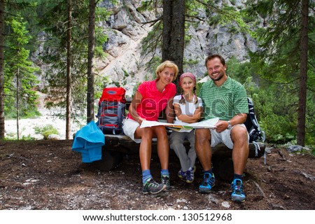 Family on hike, Family planning mountain trek - Dolomites - Italy