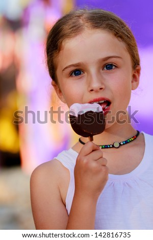 Summer joy - portrait of lovely girl with ice cream, happy childhood
