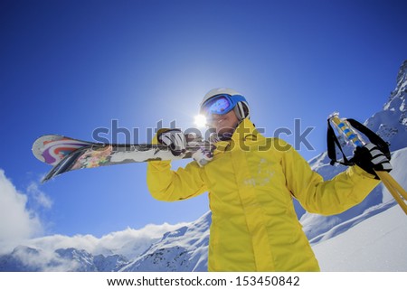 Skier, skiing, winter sport - portrait of beautiful female skier