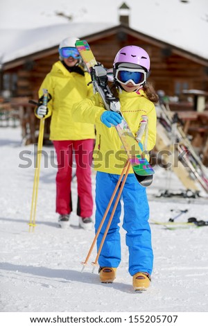 Ski, ski resort, winter sports - family on ski vacation, apres ski