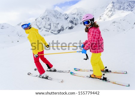 Ski, skiers on ski run - child skiing downhill, ski lesson
