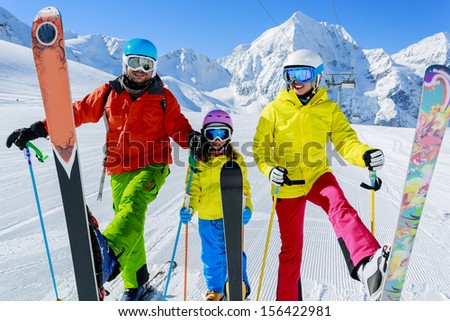 Ski, skier, snow and fun  - family enjoying winter vacations