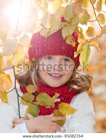 Autumn - Beautiful girl portrait in autumn park (space for text)