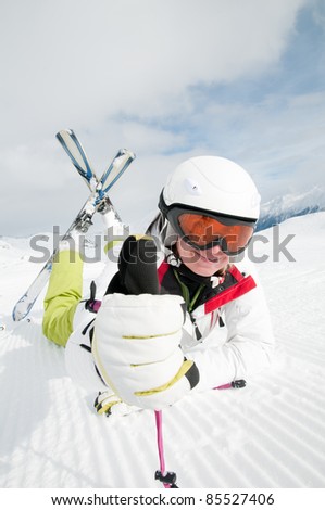 Ski, snow, sun and fun - happy skier in winter resort (space for text, cover)