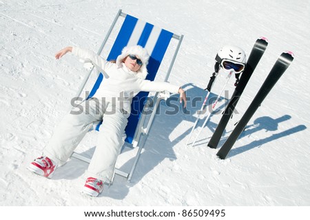 Ski vacation -resting skier in ski resort