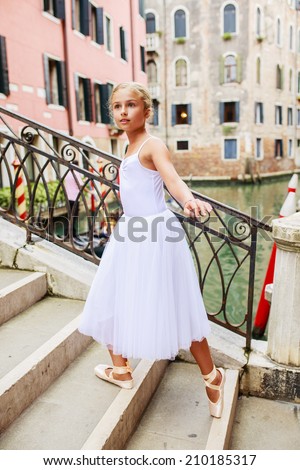 Ballet, ballerina - young and beautiful ballet dancer in Venice, Italy