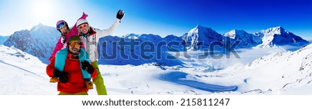 Ski, skier, snow and fun - family enjoying winter vacations