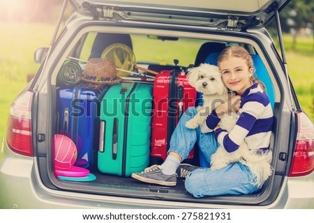 Summer vacation, young girl ready for travel for family vacation-filtered