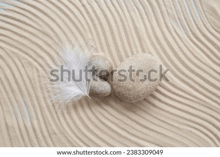 Similar – Image, Stock Photo Pebbles and feathers on table