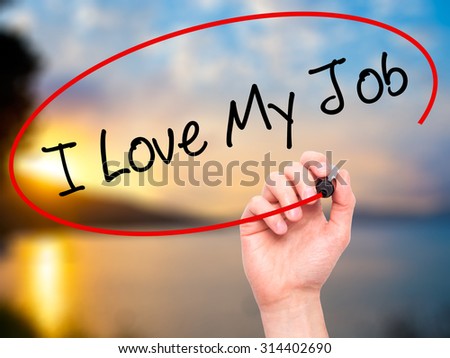 Man Hand writing I Love My Job  with black marker on visual screen. Isolated on nature. Business, technology, internet concept. Stock Photo