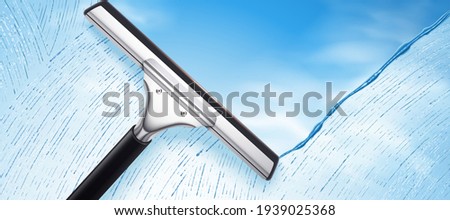 Squeegee cleaning glass against blue sky background in 3D illustration, ad background for glass cleaning product