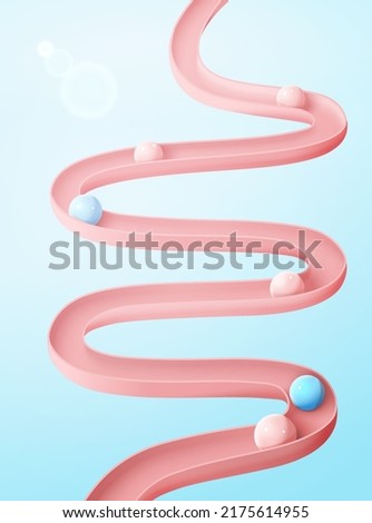 3d pink gut model or intestinal tract mock-up with balls rolling down. Body organ model isolated on light blue background. Concept of healthy digestive system.