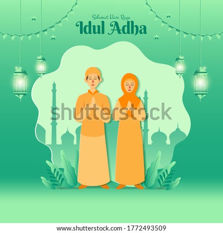 Eid al-Adha greeting card concept illustration in paper cut style with cartoon muslim couple blessing Eid al-Adha with mosque as background. Selamat hari raya Idul Adha translates to Eid al Adha 
