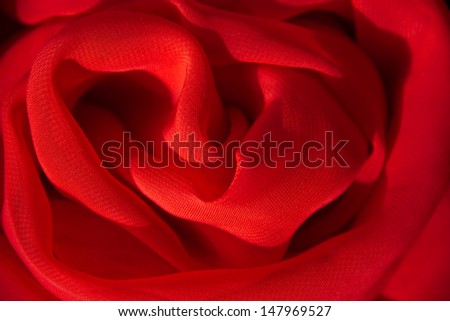 Bright red background of the neckerchief, which was formed as a circle.