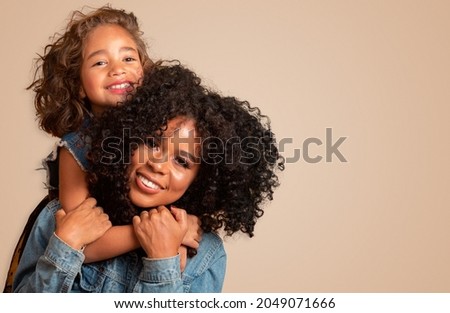 Similar – Image, Stock Photo Young mother and child hugging. Mothers day