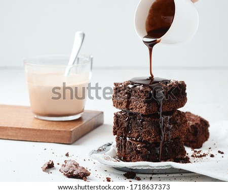 Similar – Image, Stock Photo Chocolate sauce on brownie cake