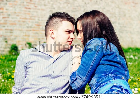 Girl and boy looking each other in the eye