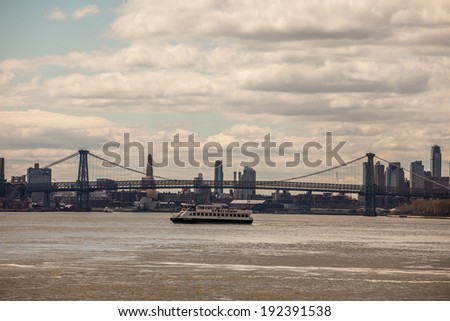 NEW YORK - APRIL 27: Williamsburg Bridge on April 27, 2014 in New York. The Williamsburg Bridge is a suspension bridge in New York City across the East River connecting Manhattan with Brooklyn.