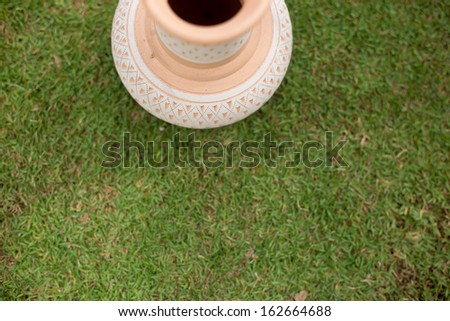 Vase on a grass with bird view
