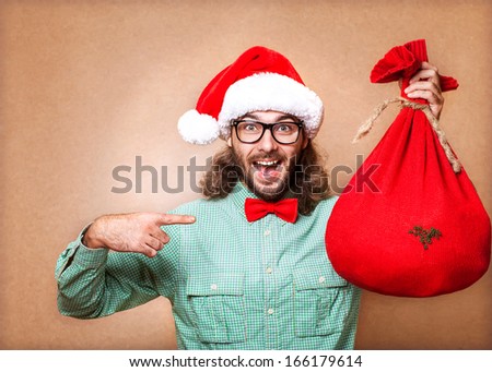hipster in Santa Claus clothes with the socks of the presents