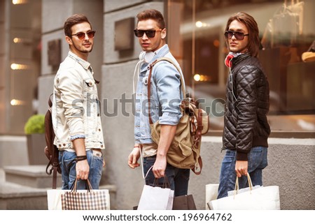 Three men fashion shop shopping walk