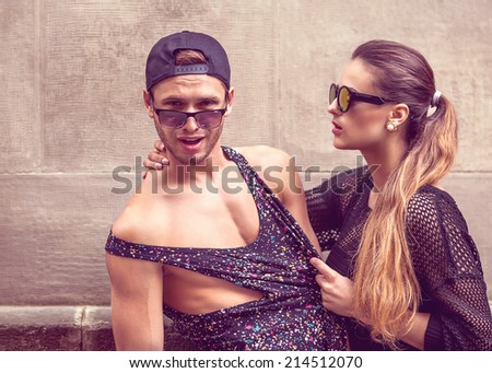 Sexy and fashionable couple, sunglasses. Vogue