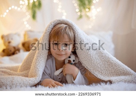 Similar – Image, Stock Photo knitting, gorgeous light green centerpiece