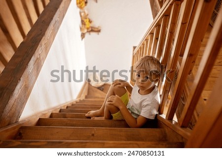 Similar – Image, Stock Photo Child sitting on stairs in skatepark