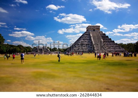 Mayan Ruin, the Pyramid - Chichen Itza Mexico, people walking around, blurred filter applied