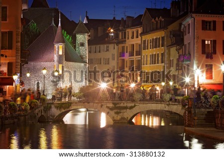 Palais de l\'isle, beautiful town square, busy at night. Annecy is known to be called the French Venice