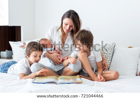 Similar – Image, Stock Photo Three little kids sitting on a hammock