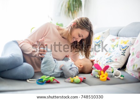 Similar – Image, Stock Photo Kid grabs his toy Child