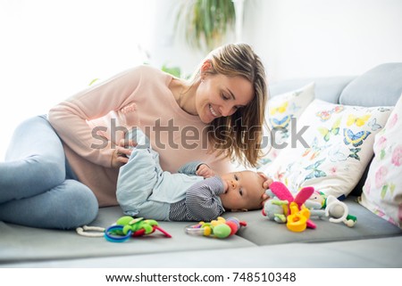 Similar – Image, Stock Photo Kid grabs his toy Child