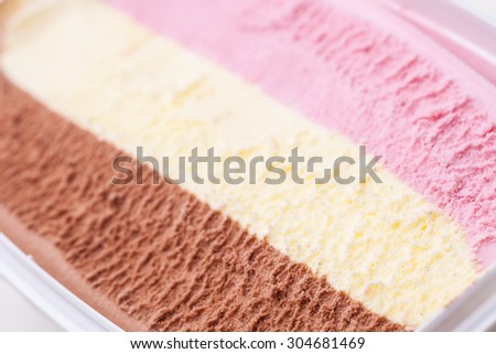 open ice cream box with three kinds of icecream