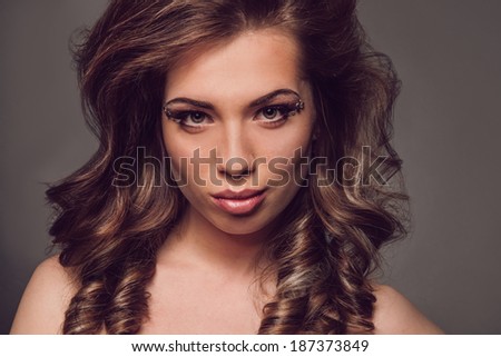 portrait of a beautiful girl with beautiful hair, beautiful eyes, lips, interesting hairstyle