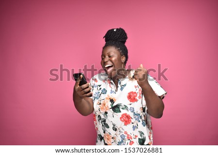 Similar – Image, Stock Photo Content young black lady reading notes while lying on bed