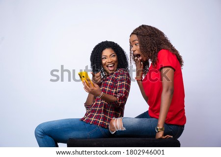 Similar – Image, Stock Photo Content young black lady reading notes while lying on bed