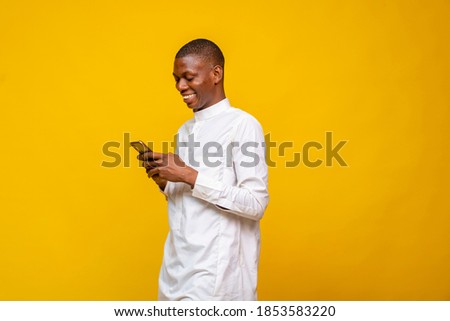 Similar – Image, Stock Photo Islamic man using smartphone on street