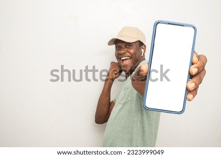 Similar – Image, Stock Photo Cheerful black man in stylish outfit on street