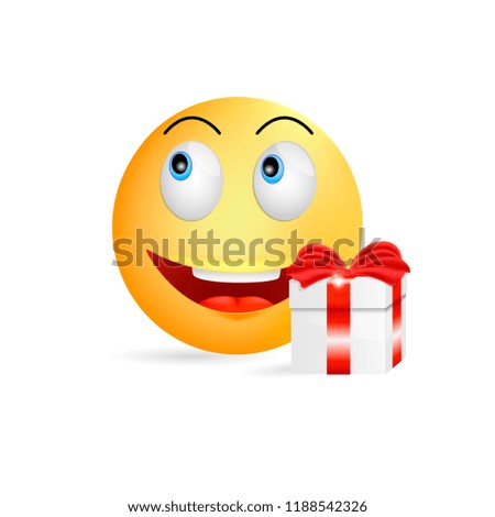 Round yellow smiling emoticon near gift box with red stripe and bow isolated on white background