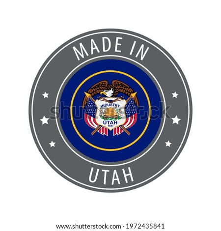 Made in Utah icon. Gray stamp with a round state flag.