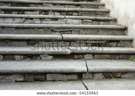 Cracked stone steps form a pattern