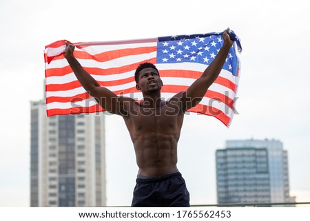 Similar – Image, Stock Photo American flag on street in New York City