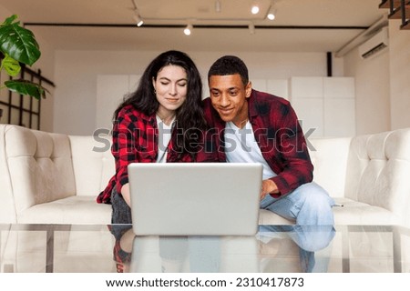 Similar – Image, Stock Photo Multiracial couple in the park