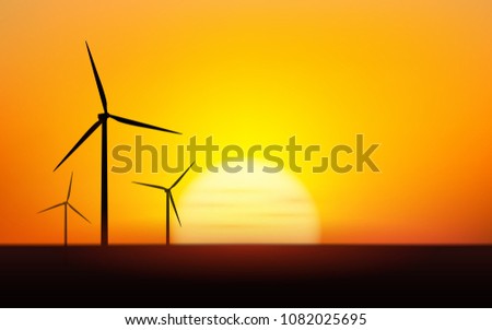 Silhouette wind turbines field with sunset sky background